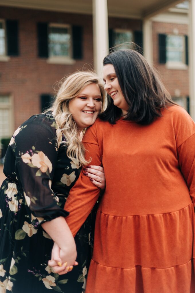 Two women taking couple photos at UNC Chapel Hill
