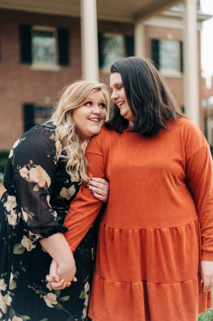 Two women taking couple photos at Chapel Hill's Carolina Inn